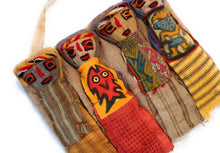 Load image into Gallery viewer, Funerary Dolls, Fertility Amulet Wall Hanging. Four Dolls Wrapped on Handwoven Traditional Peruvian Textile. 8&quot; W x 6&quot; H.